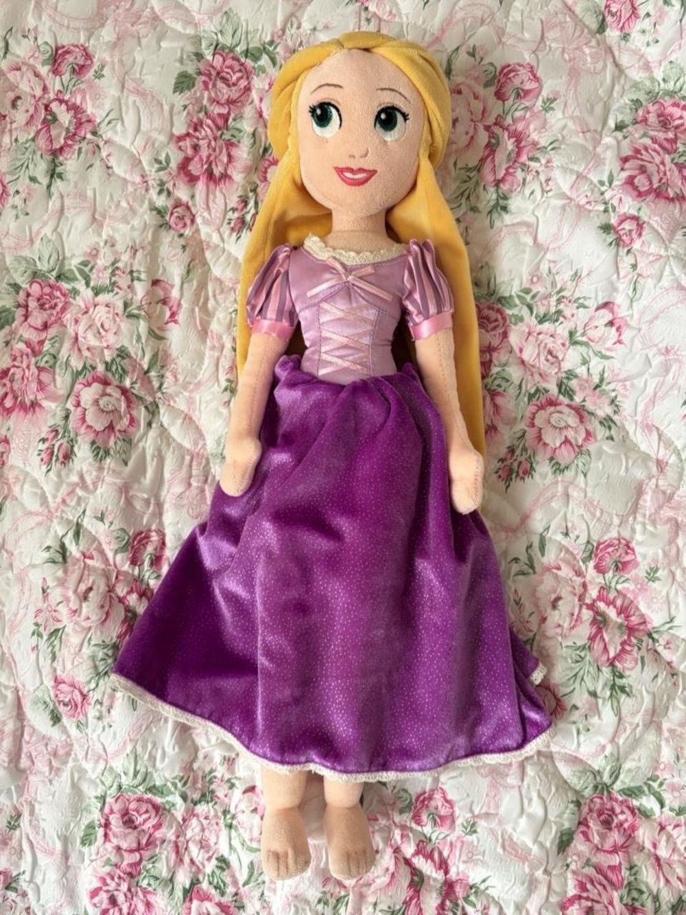 Large 19in Disney Rapunzel plush doll in purple dress with pink accents.